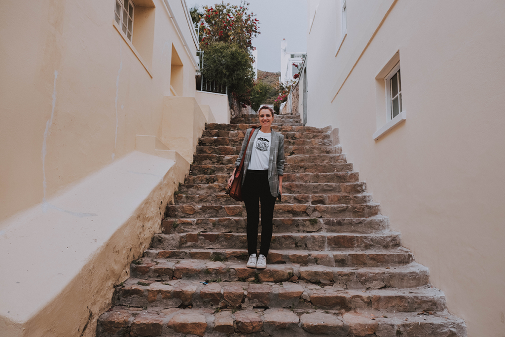 Girl standing on steps in Simonstad.