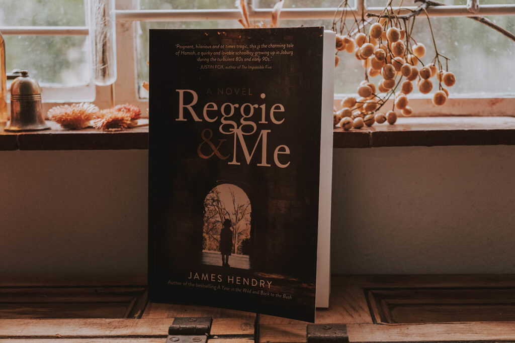 Front cover of Reggie and Me by James Hendry on kitchen counter.